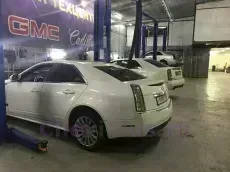 Почему в салоне Кадиллак CTS происходит вибрация